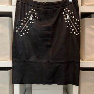 Leather studded mini skirt